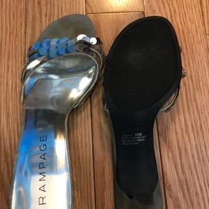 Silver heels slightly worn. Size 10!